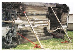 Two CRUTCH units in a 'tensioned buttress' setup. The forward unit end-tool is in a hole in the unit-body. The rear end-tool has a flat insertion tool under the rocker channel. Handles, shown attached, convert the CRUTCH to a lolly column. Two CRUTCH units in a 'tensioned buttress' setup. The forward unit end-tool is in a hole in the unit-body. The rear end-tool has a flat insertion tool under the rocker channel. Handles, shown attached, convert the CRUTCH to a lolly column.