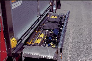 Placing equipment items that logically will be used together at the scene of an incident should be located in a convenient position. The Newton Abbott rescue carries air shores, extensions and foot plates in an underbody compartment with a pull-out drawer.