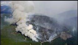 The Moose Fire continues to burn west of Glacier National Park and north of Columbia Falls, Mont., Saturday, Sept. 1, 2001. The wind-driven wildfire exploded overnight and more than doubled in size. The fire expanded on all sides, wiping out containment lines that firefighters had established in the previous week as it grew from 19,000 acres on Friday to 40,300 acres by Saturday morning, an official said. The Moose Fire continues to burn west of Glacier National Park and north of Columbia Falls, Mont., Saturday, Sept. 1, 2001. The wind-driven wildfire exploded overnight and more than doubled in size. The fire expanded on all sides, wiping out containment lines that firefighters had established in the previous week as it grew from 19,000 acres on Friday to 40,300 acres by Saturday morning, an official said.