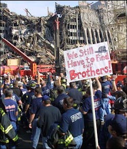 Firefighters protested a plan to scale back the number of fire and police personnel searching for remains at the World Trade Center site., Friday Nov. 2, 2001. Firefighters protested a plan to scale back the number of fire and police personnel searching for remains at the World Trade Center site., Friday Nov. 2, 2001.