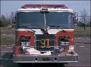 Note the position of the front suction swivel and the headlights on Warminster, PA, Engine 91. Be careful not to block forward-facing lights with bumper-mounted appliances and fittings.