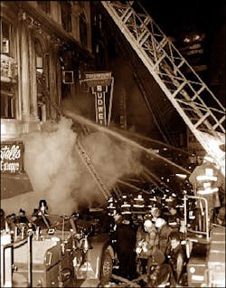 Ladder Companies 15, 17, 18 (left to right) operating on Boylston Street.