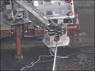 Firefighters were still on the scene, battling the blaze early Friday afternoon.