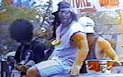 FLASHBACK: Since-canned firefighter Jonathan Walters in blackface on Broad Channel&apos;s &apos;Texas truck drag&apos; parade float. CBS