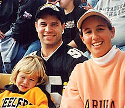 Happier times: Eric and Andrea Fonte of Jacksonville and daughter Victoria attend a Pittsburgh Steelers game in November. Eric died in a commuter plane crash in Charlotte on Wednesday.