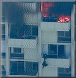 A rescue team member tries to save the man who apparently started the high-rise fire. The rescue failed and the man fell to his death.
