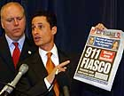 U.S. Reps. Joe Crowley (D-Queens, left) and Anthony Weiner (D-Brooklyn) use yesterday's Post to make their case in D.C. for cell-phone regulations that would make it easier to track calls.