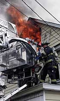 HEROES: Volunteer firemen T. J. Fernandez and Ryan Cassidy followed the black cloud to a Roosevelt home where they rescued 4-year-old twins from the blaze. HEROES: Volunteer firemen T. J. Fernandez and Ryan Cassidy followed the black cloud to a Roosevelt home where they rescued 4-year-old twins from the blaze.