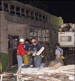 Rescue workers remove blocks of rubble at the National Guard Armory in Pierce City, Mo. in the early morning hours of Monday May 5, 2003. Victims were reportedly buried after a tornado passed through the area on Sunday evening. Eight people were feared dead in the city's damaged National Guard Armory, Lawrence County Sheriff Doug Seneker said Rescue workers remove blocks of rubble at the National Guard Armory in Pierce City, Mo. in the early morning hours of Monday May 5, 2003. Victims were reportedly buried after a tornado passed through the area on Sunday evening. Eight people were feared dead in the city's damaged National Guard Armory, Lawrence County Sheriff Doug Seneker said
