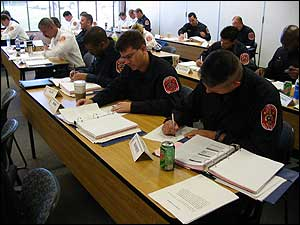 OCS students work diligently to complete the daily quiz. A course grade of 85 percent or greater is needed in order to successfully complete the program