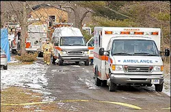 AMR drive away with the victims that were pronounced dead from a house fire that occured early Sunday morning along Riley Street near 168th Avenue in Park Township. AMR drive away with the victims that were pronounced dead from a house fire that occured early Sunday morning along Riley Street near 168th Avenue in Park Township.