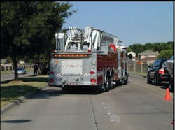 With the tandem-axle ladder truck blocking for the ambulance, a protected work area of almost three lanes of traffic is created. With this 'block to the left', the driver/operator exits into traffic, but the officer and crew exit to the shadow side. With the tandem-axle ladder truck blocking for the ambulance, a protected work area of almost three lanes of traffic is created. With this 'block to the left', the driver/operator exits into traffic, but the officer and crew exit to the shadow side.