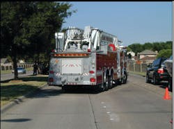 With the tandem-axle ladder truck blocking for the ambulance, a protected work area of almost three lanes of traffic is created. With this &apos;block to the left&apos;, the driver/operator exits into traffic, but the officer and crew exit to the shadow side.