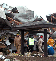 Investigators approach precarious situation as they search for the cause.