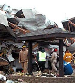 Investigators approach precarious situation as they search for the cause. Investigators approach precarious situation as they search for the cause.