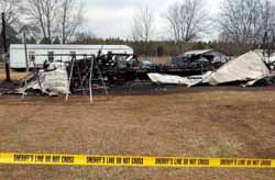 Witnesses said it took about seven minutes for this mobile home in the Speake community to burn