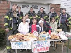 Neighbors and firefighters gather in Bay Terrace to raise money for the victims of a deadly fire last week on 215th Street. Neighbors and firefighters gather in Bay Terrace to raise money for the victims of a deadly fire last week on 215th Street.
