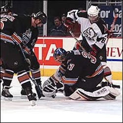 Olie Kolzig saves a shot on goal during Wednesday's game against the Buffalo Sabres at the MCI Center. The Washington Capitals hosted public safety personnel from the National Capital Area for Hero's night, which included a video tribute to 'Dino'. Washington Sports and Entertainment provided a suite for the Mahaffey family during the game. Olie Kolzig saves a shot on goal during Wednesday's game against the Buffalo Sabres at the MCI Center. The Washington Capitals hosted public safety personnel from the National Capital Area for Hero's night, which included a video tribute to 'Dino'. Washington Sports and Entertainment provided a suite for the Mahaffey family during the game.