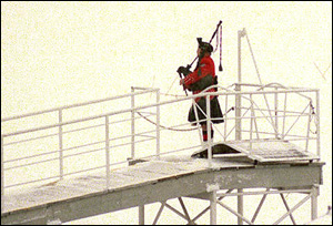 Bagpiper Bob Grant of the New Hampshire Professional Pipes and Drum group played