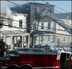 Firefighters yesterday battle the blaze, which killed a couple and their daughter, 5.