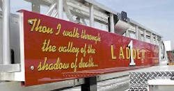 New display -- Marion Fire Department's Ladder 1 truck now displays a portion of Psalm 23, 'Thou I walk through the valley of the shadow of death I fear no evil.' The first word is misspelled, and fire Chief Steve Gorrell said the department planned to get it corrected. New display -- Marion Fire Department's Ladder 1 truck now displays a portion of Psalm 23, 'Thou I walk through the valley of the shadow of death I fear no evil.' The first word is misspelled, and fire Chief Steve Gorrell said the department planned to get it corrected.