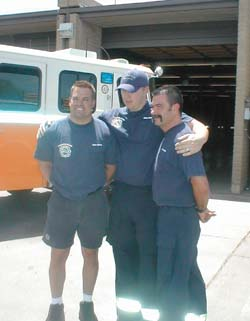Left to right, firefighters Sean Alford, Chris James and Capt./Paramedic Tom Lazzaro helped lift a car off of a child Tuesday.