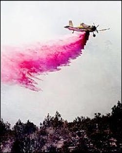 A single engine air tanker, one of two stationed at the St. George Airport, makes a drop Tuesday while fighting the Utah Hill fire. One of the tankers crashed Thursday fighting the Dammeron Fire.