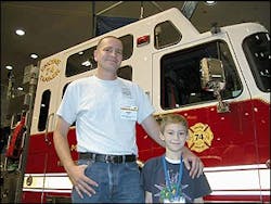 Randy West and his son Michael at Firehouse Expo. Randy West and his son Michael at Firehouse Expo.