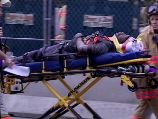 Six construction workers were transported to area hospitals. Of those, one was still hospitalized with critical injuries late Friday afternoon.