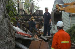 A Fire Investigator and Washington Gas Company official discuss the possible source of the explosion.