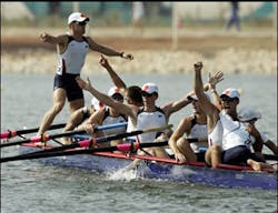 Olympic champion bowman Jason Read of the USA stands on the boat as he celebrates with teammates after the men's rowing eights final at the Athens 2004 Olympic Games Aug. 22, 2004. The U.S. won gold. Olympic champion bowman Jason Read of the USA stands on the boat as he celebrates with teammates after the men's rowing eights final at the Athens 2004 Olympic Games Aug. 22, 2004. The U.S. won gold.