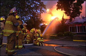 Firefighters fight a fire at the Alpha Tau Omega Fraternity House on the University of Mississippi campus in Oxford, Miss. Friday Aug. 27, 2004 where three students are unaccounted-for following an early morning fire.