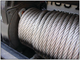 The 'wraps' of wire rope (commonly called 'cable' by fire/rescue personnel) create the multiple 'layers' on the drum of this rescue vehicle's winch.