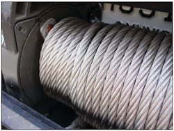 The &apos;wraps&apos; of wire rope (commonly called &apos;cable&apos; by fire/rescue personnel) create the multiple &apos;layers&apos; on the drum of this rescue vehicle&apos;s winch.