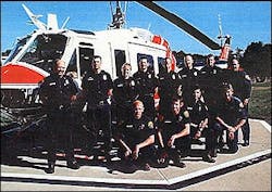California Department of Forestry firefighter Eva Schicke, back row, third from the left, is shown in a photo with fellow Helitack Crew members released by the California Department Forestry in Sacramento, Calif., on Monday, Sept. 13, 2004. Eva Schicke, 24, was killed fighting a fire in the Stanislaus National Forest on Sunday. Schicke is the first female firefighter killed in the line of duty.