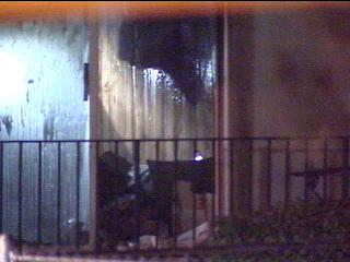 Sources indicate that one child ran back inside the burning apartment to try to save her trapped sister