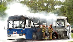 Firefighters extinguish a fire on a Budget Rent A Car shuttle bus near Fort Lauderdale-Hollywood International Airport Firefighters extinguish a fire on a Budget Rent A Car shuttle bus near Fort Lauderdale-Hollywood International Airport