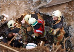 Members of rescue teams try to reach six fire-fighters, who are still trapped in the debris, after the ceiling of an underground car park collapsed during a fire, Saturday, Nov 27, 2004, in Gretzenbach, northern Switzerland Members of rescue teams try to reach six fire-fighters, who are still trapped in the debris, after the ceiling of an underground car park collapsed during a fire, Saturday, Nov 27, 2004, in Gretzenbach, northern Switzerland