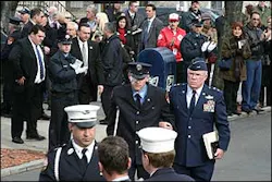 F.F. Daniel Swift arrives at the funeral of Christian Engeldrum in The Bronx NYC. Swift was injured in the same Humvee incident in which Engeldrum was killed.