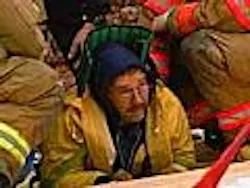 Rescuers Work Carefully To Save Man