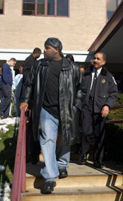 Volunteer Captain Joe Johnson and Acting Fire Chief Lawrence Sedgwick, Jr. leave the rehabilitation hospital Wednesday after speaking with reporters. Johnson told reporters, 'I intend to return to duty as a firefighter.' Volunteer Captain Joe Johnson and Acting Fire Chief Lawrence Sedgwick, Jr. leave the rehabilitation hospital Wednesday after speaking with reporters. Johnson told reporters, 'I intend to return to duty as a firefighter.'