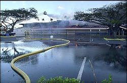 Firefighters battle a fire that consumes Ah Fook's Super Market in Kahului, Hawaii. Firefighters battle a fire that consumes Ah Fook's Super Market in Kahului, Hawaii.