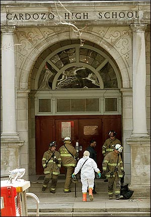 Washington Fire Department and Hazmat personnel enter Cardozo High School.
