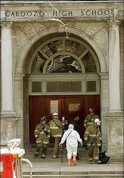 Washington Fire Department and Hazmat personnel enter Cardozo High School. Washington Fire Department and Hazmat personnel enter Cardozo High School.