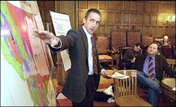 Bob Harrington, administrator for the Forestry Division of the Montana Department of Natural Resources Conservation briefs Gov. Brian Schweitzer, far right, during a fire and drought meeting in his Helena, Mont., office, Monday March 7, 2005. State officials assured Gov. Schweitzer that Montana will be prepared for what Schweitzer believes may be one of its worst wildfire seasons since 1988, when more than 2 million burned in the Northern Rockies. Hundreds of firefighters, together with helicopters and pumper trucks, are prepared, the officials said. But unknown is the possible impact of cuts in the U.S. Forest Service firefighting budget and availability of the large tanker aircraft for carrying fire retardant. Bob Harrington, administrator for the Forestry Division of the Montana Department of Natural Resources Conservation briefs Gov. Brian Schweitzer, far right, during a fire and drought meeting in his Helena, Mont., office, Monday March 7, 2005. State officials assured Gov. Schweitzer that Montana will be prepared for what Schweitzer believes may be one of its worst wildfire seasons since 1988, when more than 2 million burned in the Northern Rockies. Hundreds of firefighters, together with helicopters and pumper trucks, are prepared, the officials said. But unknown is the possible impact of cuts in the U.S. Forest Service firefighting budget and availability of the large tanker aircraft for carrying fire retardant.