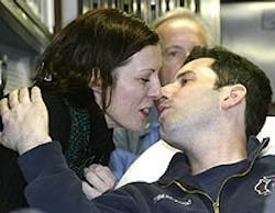 Mary Jo Starks plants a loving kiss on firefighter boyfriend Joseph DiBernardo Jr. yesterday as her intrepid hero is discharged from the hospital. Mary Jo Starks plants a loving kiss on firefighter boyfriend Joseph DiBernardo Jr. yesterday as her intrepid hero is discharged from the hospital.
