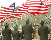 HUE MUST BE KIDDING: Firefighters proudly wear green berets at the St. Patrick's Day Parade in '03 - a tradition prohibited this year.
