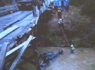 Gastonia firefighters battled the freezing cold water to rescue the woman off Thompson Road, just north of the South Carolina border.