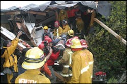 This victim was rescued after a lengthy extrication deep into the debris of a structure. Two other victims who were found in the same area did not survive. This victim was rescued after a lengthy extrication deep into the debris of a structure. Two other victims who were found in the same area did not survive.