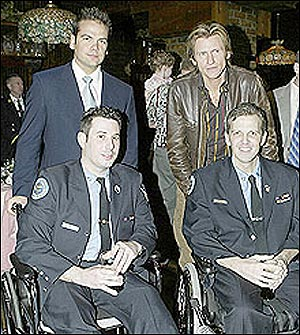 Post publisher Lachlan Murdoch and actor Denis Leary get together yesterday to honor injured FDNY heroes Joseph DiBernardo and Jeffrey Cool and their fallen comrades.